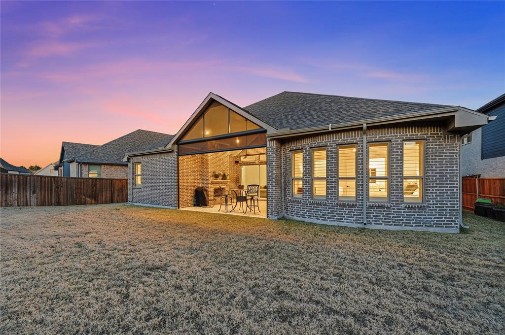 4409 Lk Vw Road Oak Point, TX 75068 - Photo 26 of 40 a front view of a house with a yard