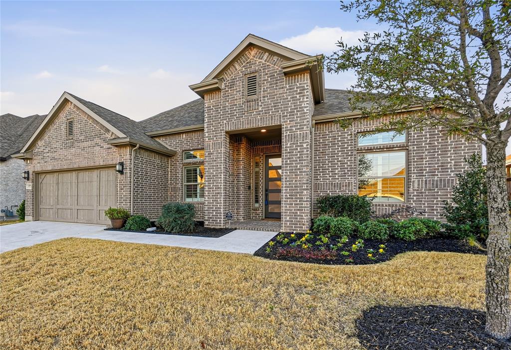 4409 Lk Vw Road Oak Point, TX 75068 - Photo 30 of 40 a front view of a house with a yard