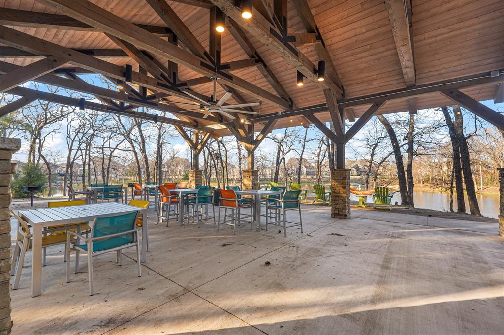 4409 Lk Vw Road Oak Point, TX 75068 - Photo 35 of 40 a view of a backyard with sitting area