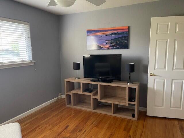 8614 Redbank Road Redding, CA 96001 - Photo 15 of 31 a view of a livingroom with furniture and a flat screen tv