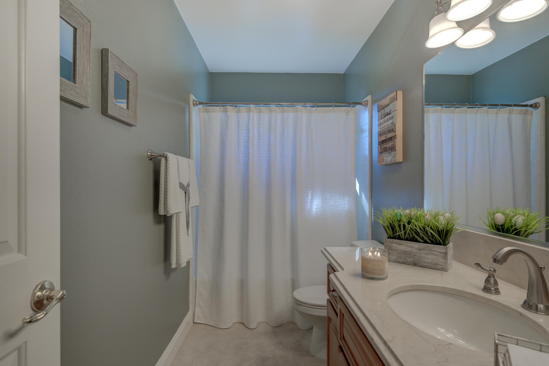 8614 Redbank Road Redding, CA 96001 - Photo 17 of 31 a bathroom with a sink toilet and shower