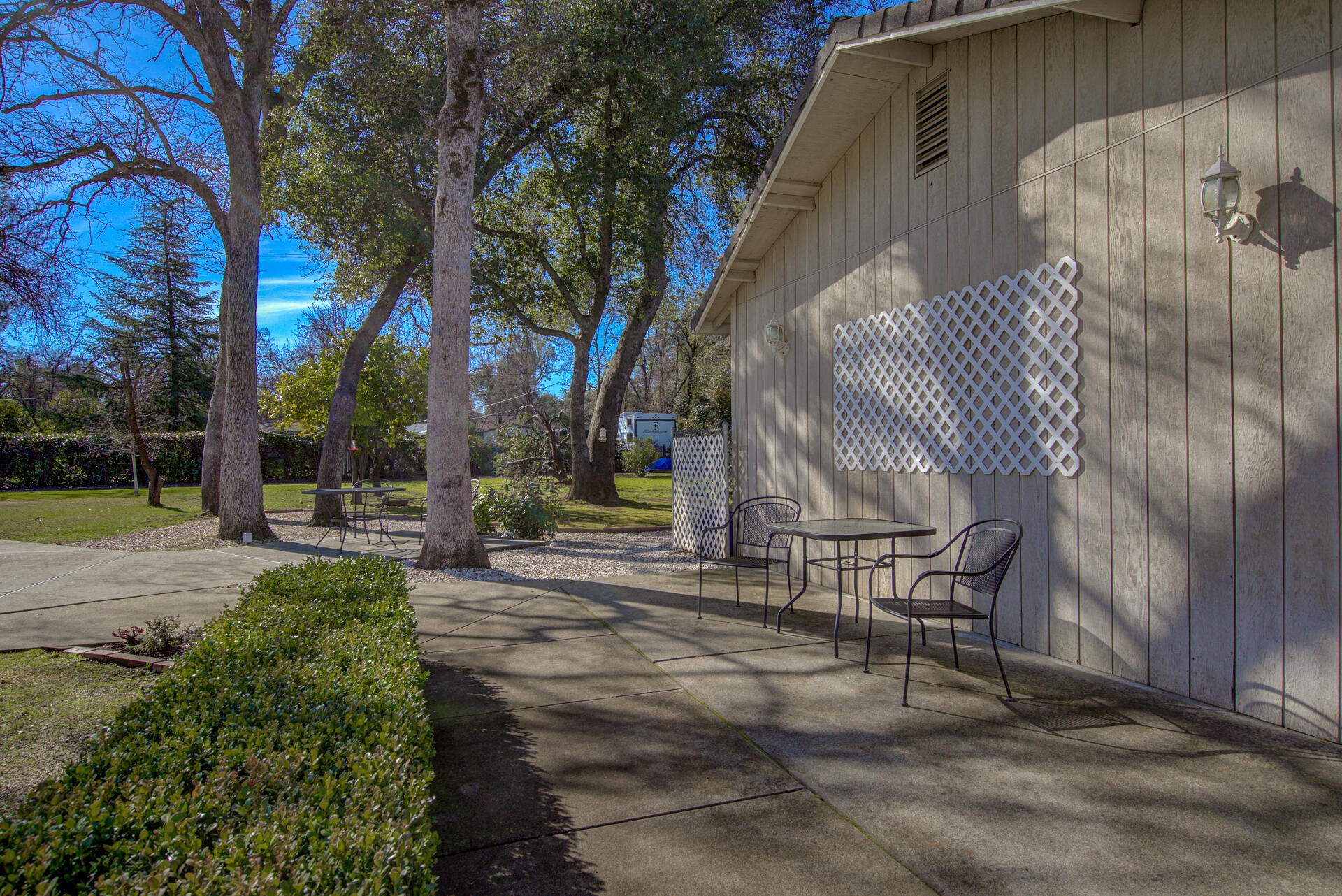 8614 Redbank Road Redding, CA 96001 - Photo 26 of 31 a view of a bench in a backyard