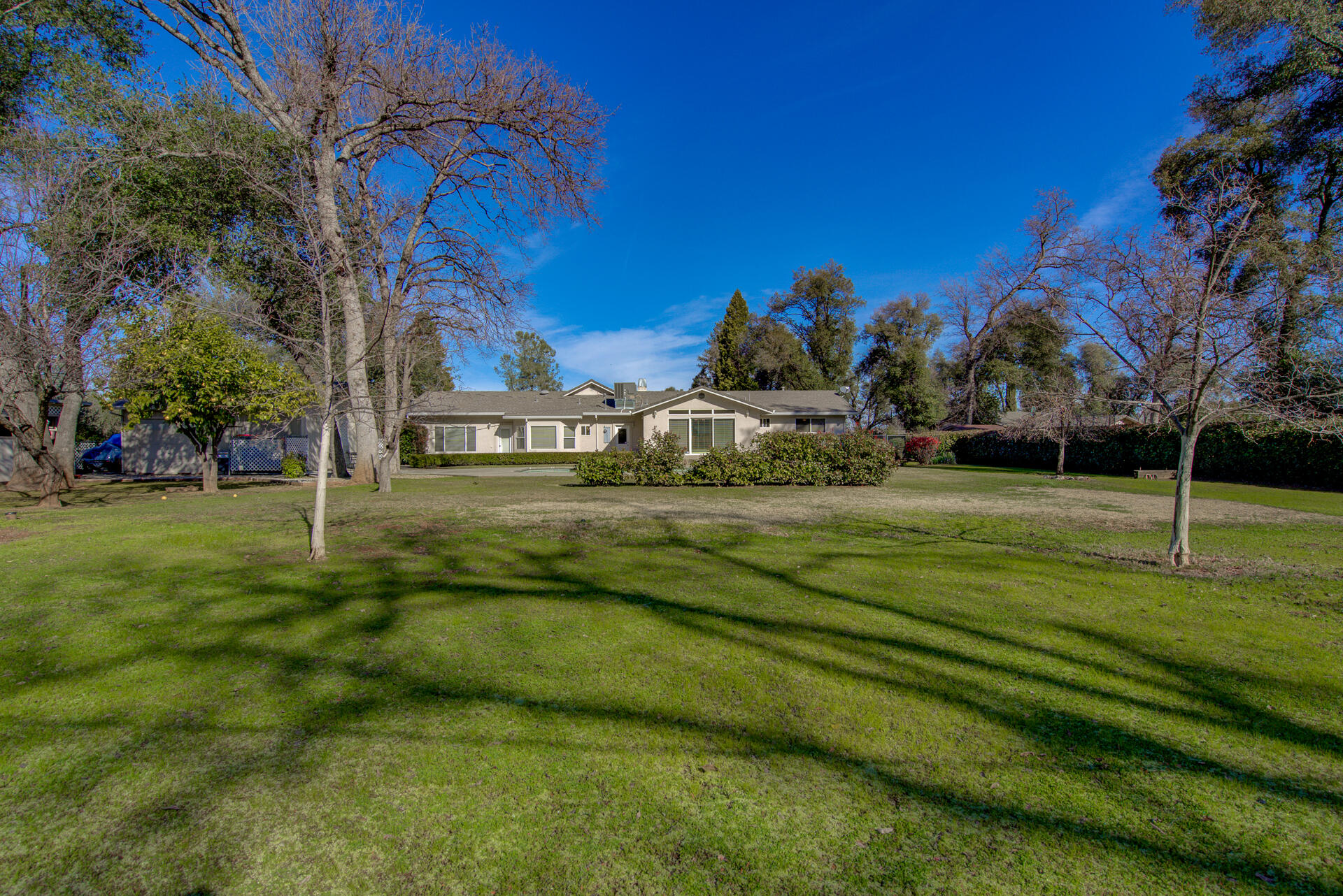 8614 Redbank Road Redding, CA 96001 - Photo 29 of 31 a view of a golf course with a house