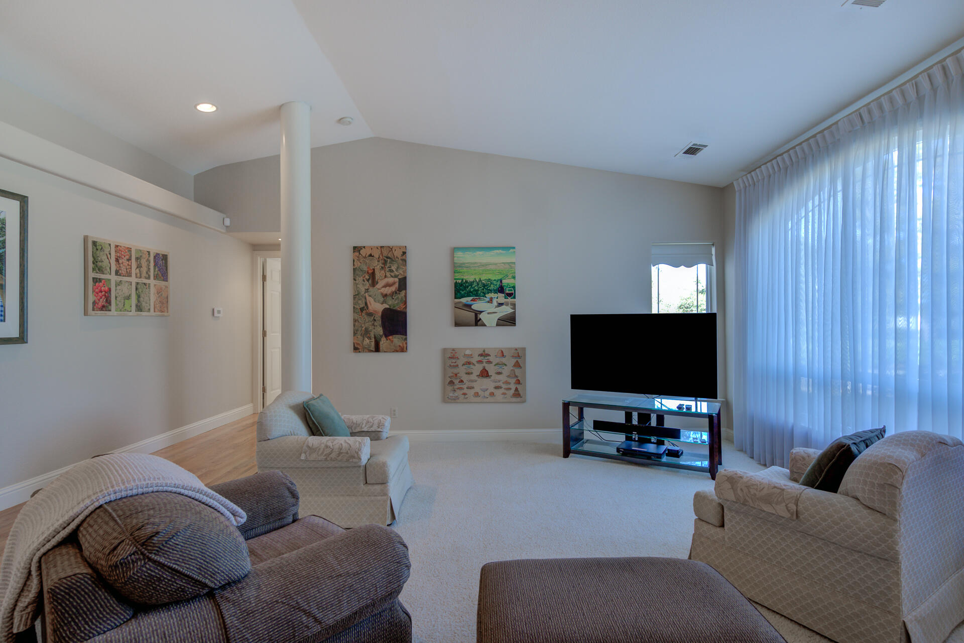 8614 Redbank Road Redding, CA 96001 - Photo 4 of 31 a living room with furniture and a flat screen tv