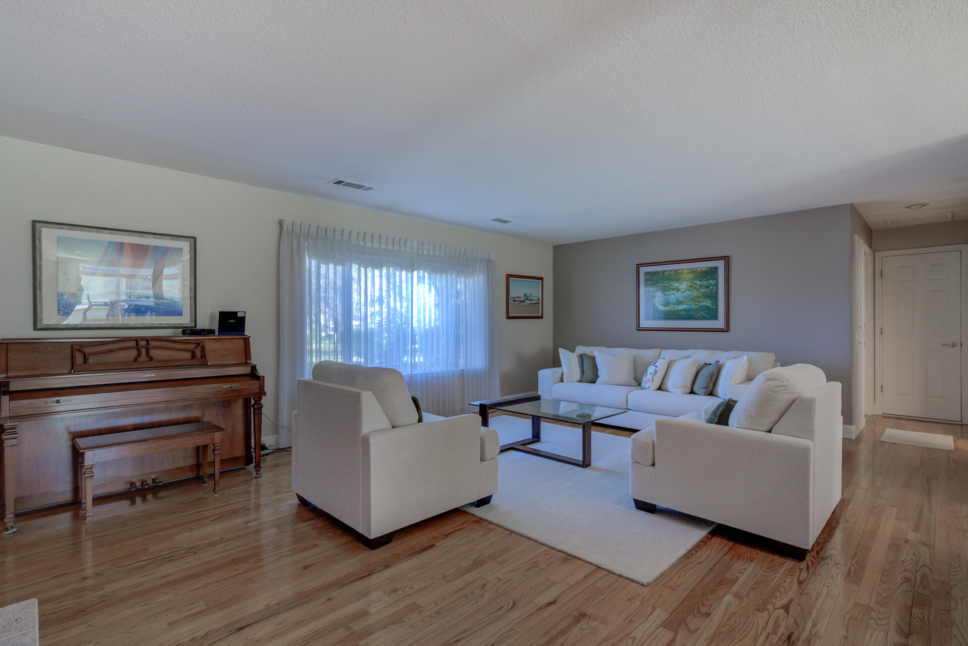 8614 Redbank Road Redding, CA 96001 - Photo 5 of 31 a living room with furniture and a wooden floor
