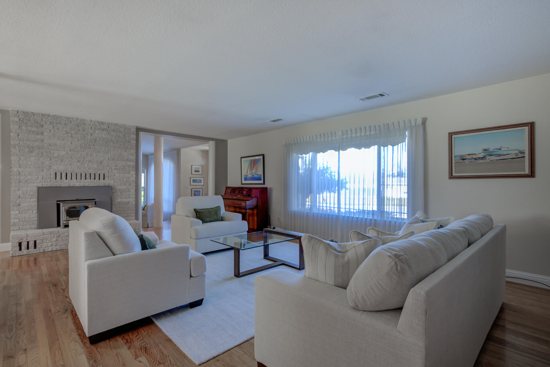8614 Redbank Road Redding, CA 96001 - Photo 6 of 31 a living room with furniture and a fireplace