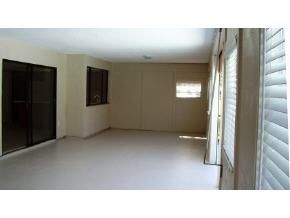 348 Ne Port Palm Bay, FL 32905 - Photo 4 of 7 a open hall with a outdoor space