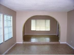 348 Ne Port Palm Bay, FL 32905 - Photo 6 of 7 a view of a livingroom with a staircase