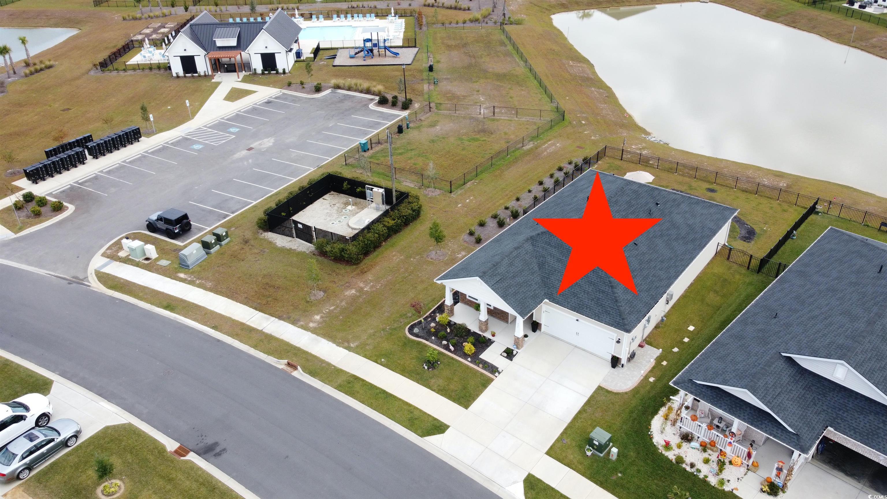 435 Rollins Drive Longs, SC 29568 - Photo 20 of 24 Drone / aerial view of a nearby body of water