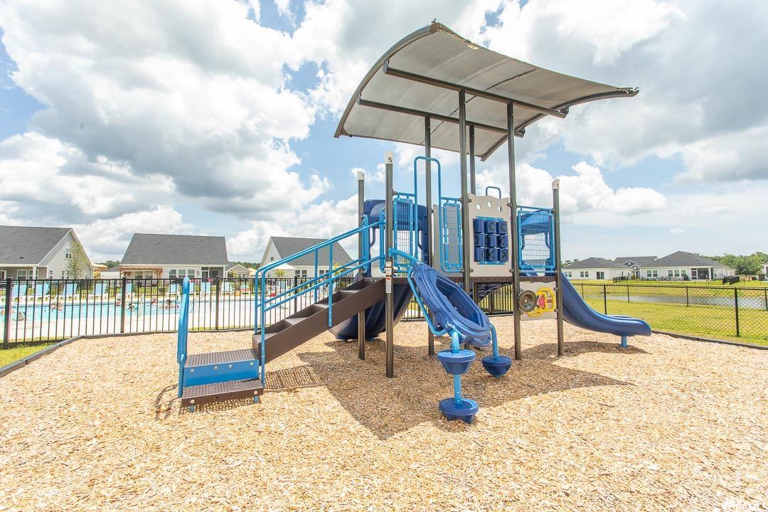 435 Rollins Drive Longs, SC 29568 - Photo 22 of 23 Community playground with a residential view