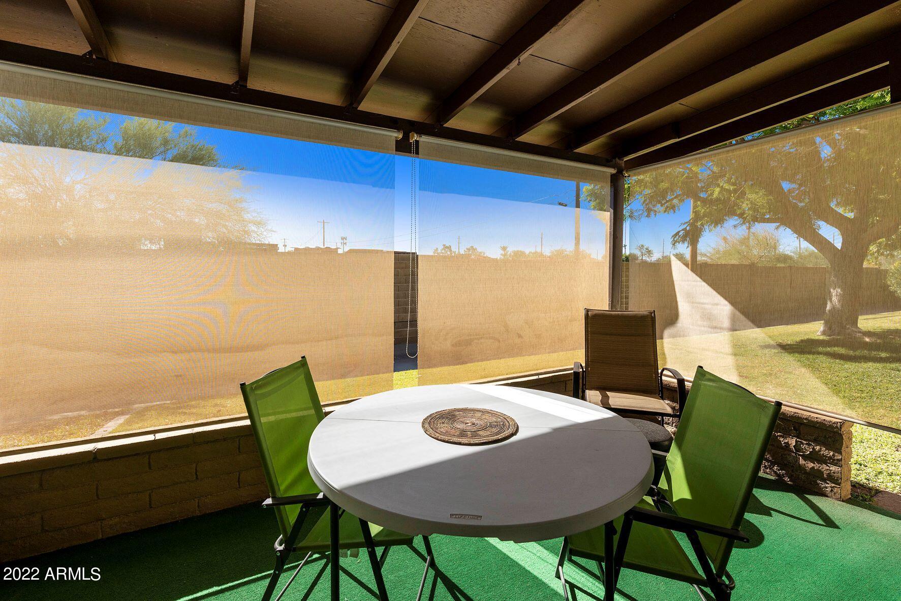 131 North Higley Road, Unit 13 Mesa, AZ 85205 - Photo 28 of 35 13 Patio Shades from inside
