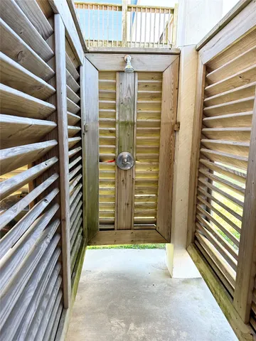 a front view of a house with a yard and porch