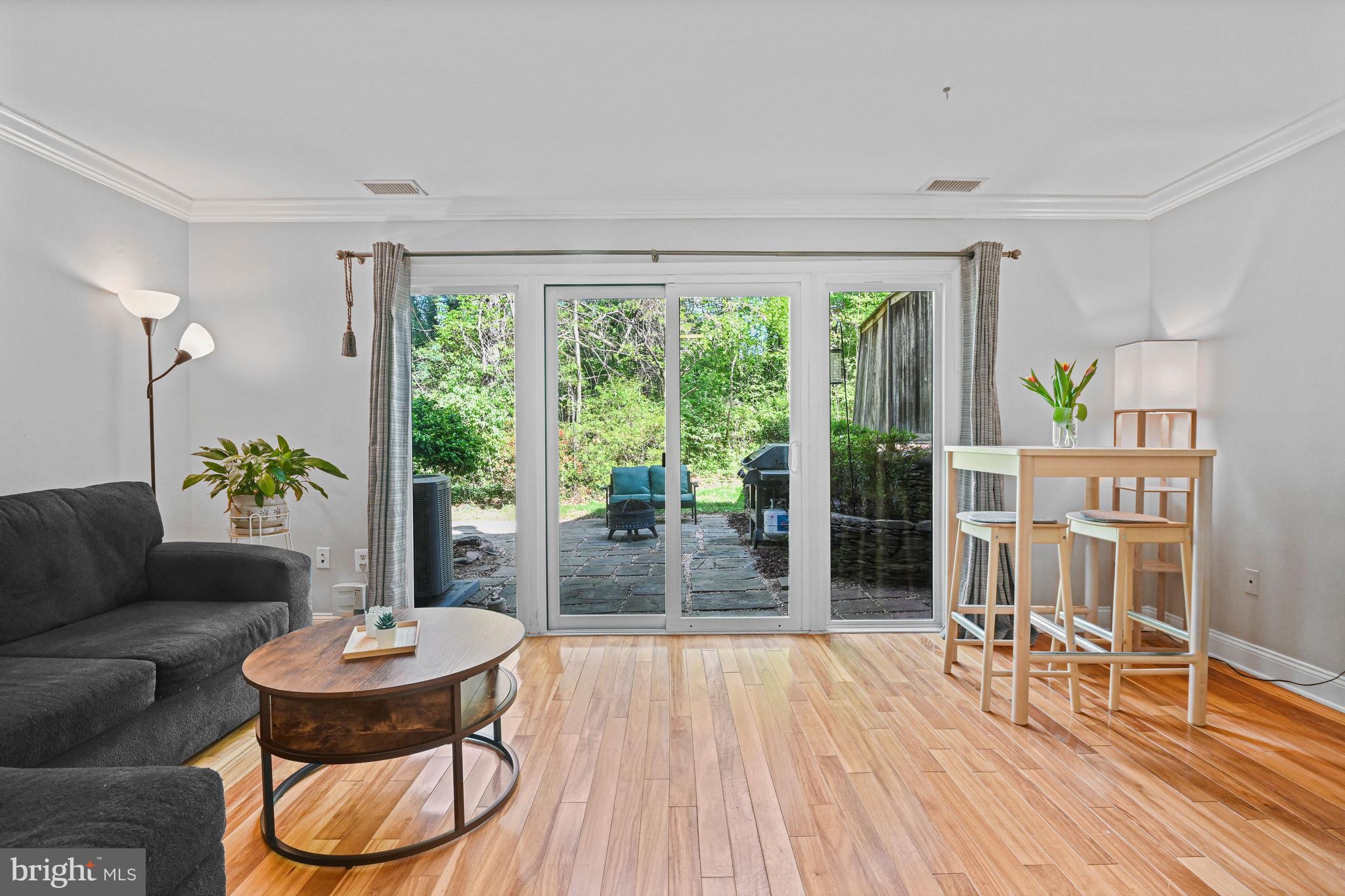 11334 Headlands Court Reston, VA 20191 - Photo 11 of 36 Cozy family room with hardwoods + walkout