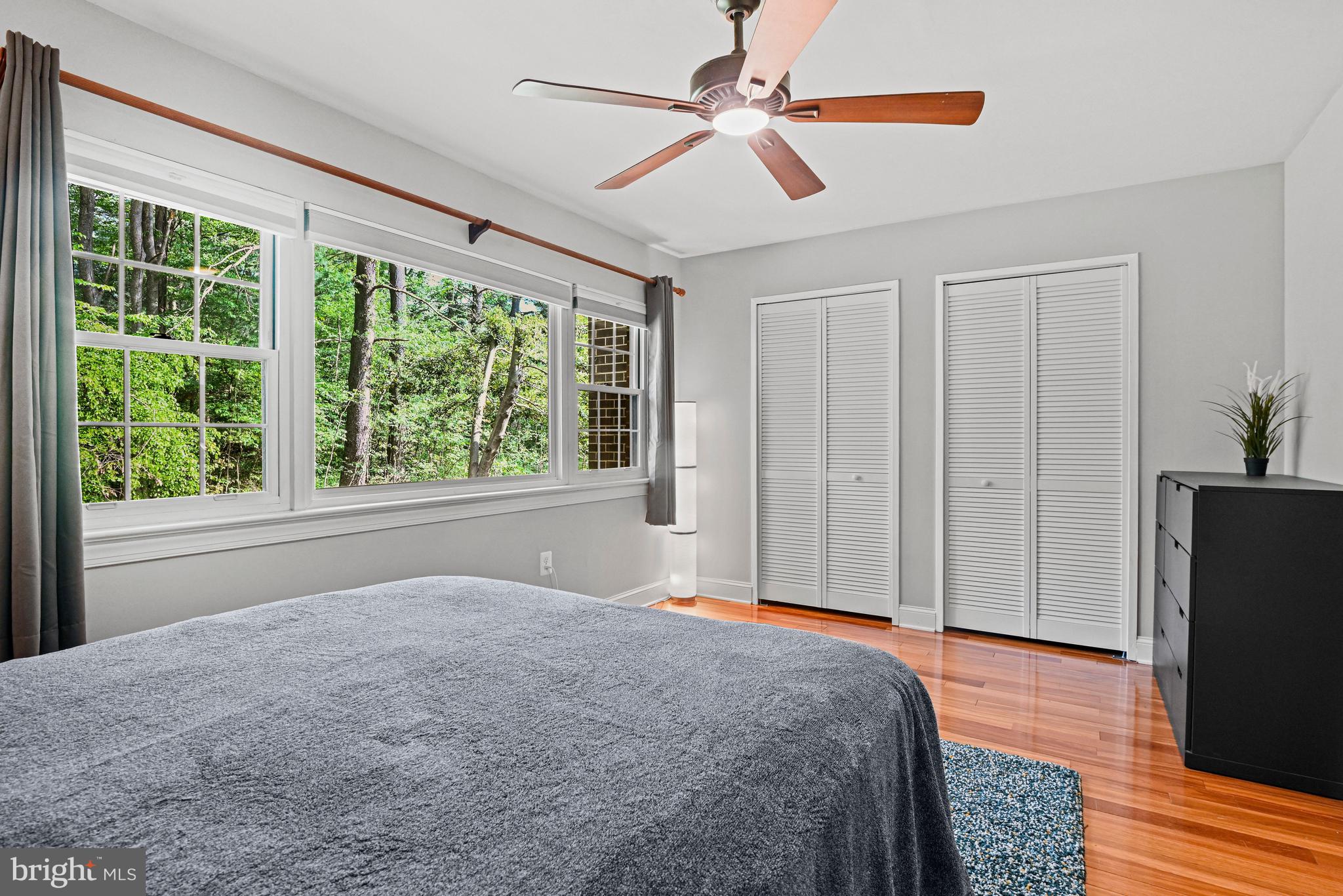 11334 Headlands Court Reston, VA 20191 - Photo 22 of 36 Enjoy a treed backdrop from the primary bedroom