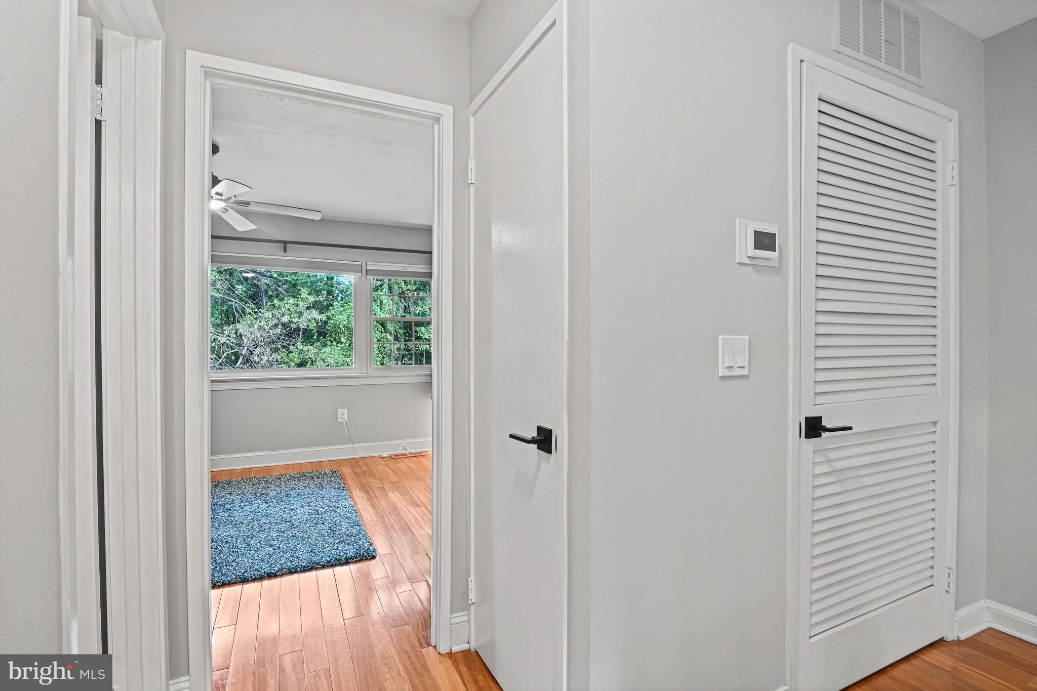 11334 Headlands Court Reston, VA 20191 - Photo 26 of 36 Upper level hallway with linen closet