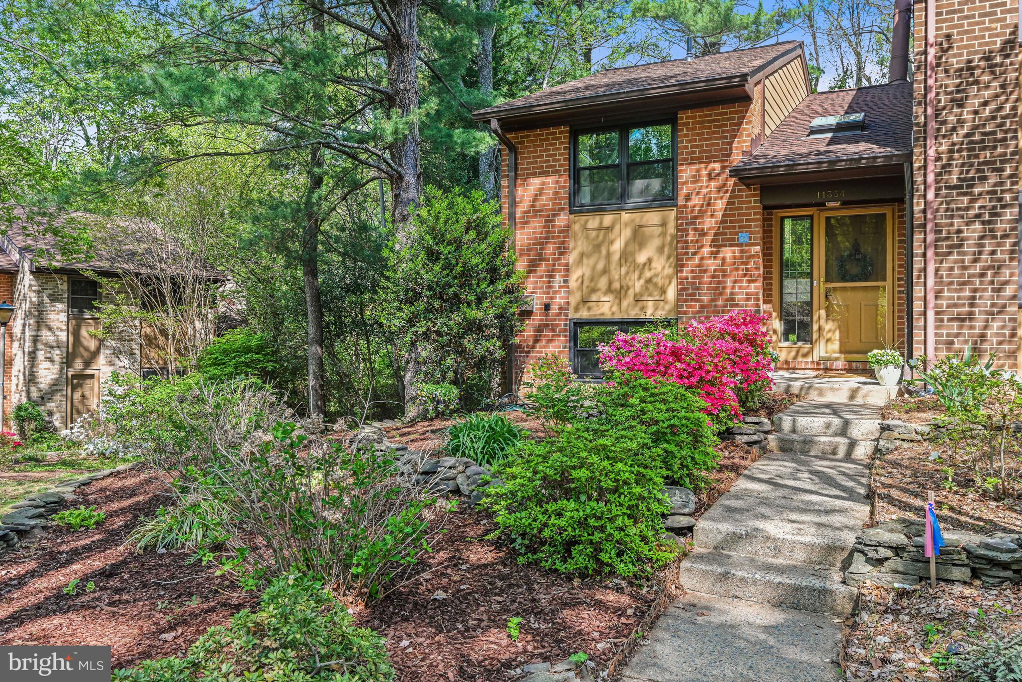11334 Headlands Court Reston, VA 20191 - Photo 3 of 36 Lush landscaping and private setting
