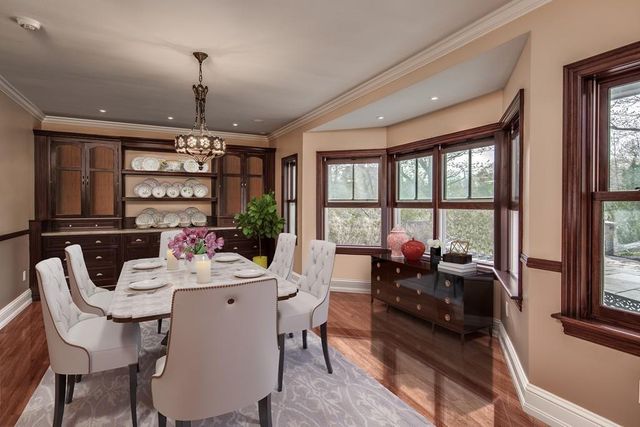 a view of a dining room with furniture window and outside view