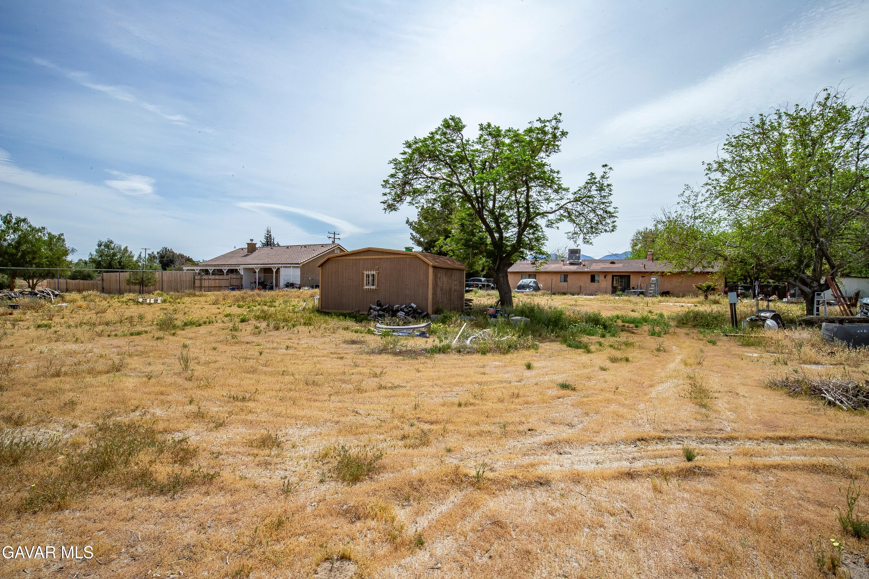 10731 East Ave R-2 Littlerock, CA 93543 - Photo 14 of 23 a view of a terrace with a garden