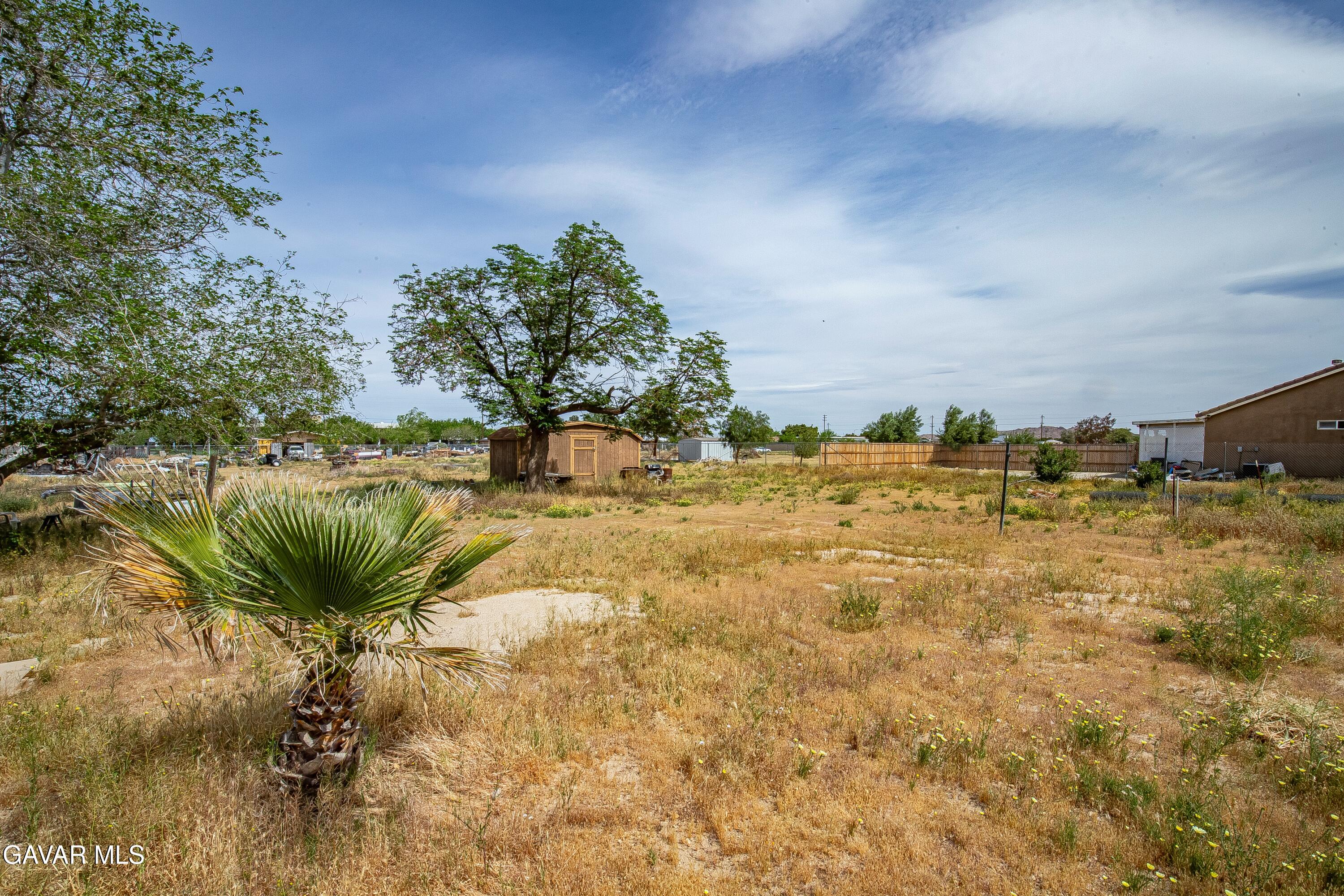 10731 East Ave R-2 Littlerock, CA 93543 - Photo 19 of 23 a view of a lake with a yard