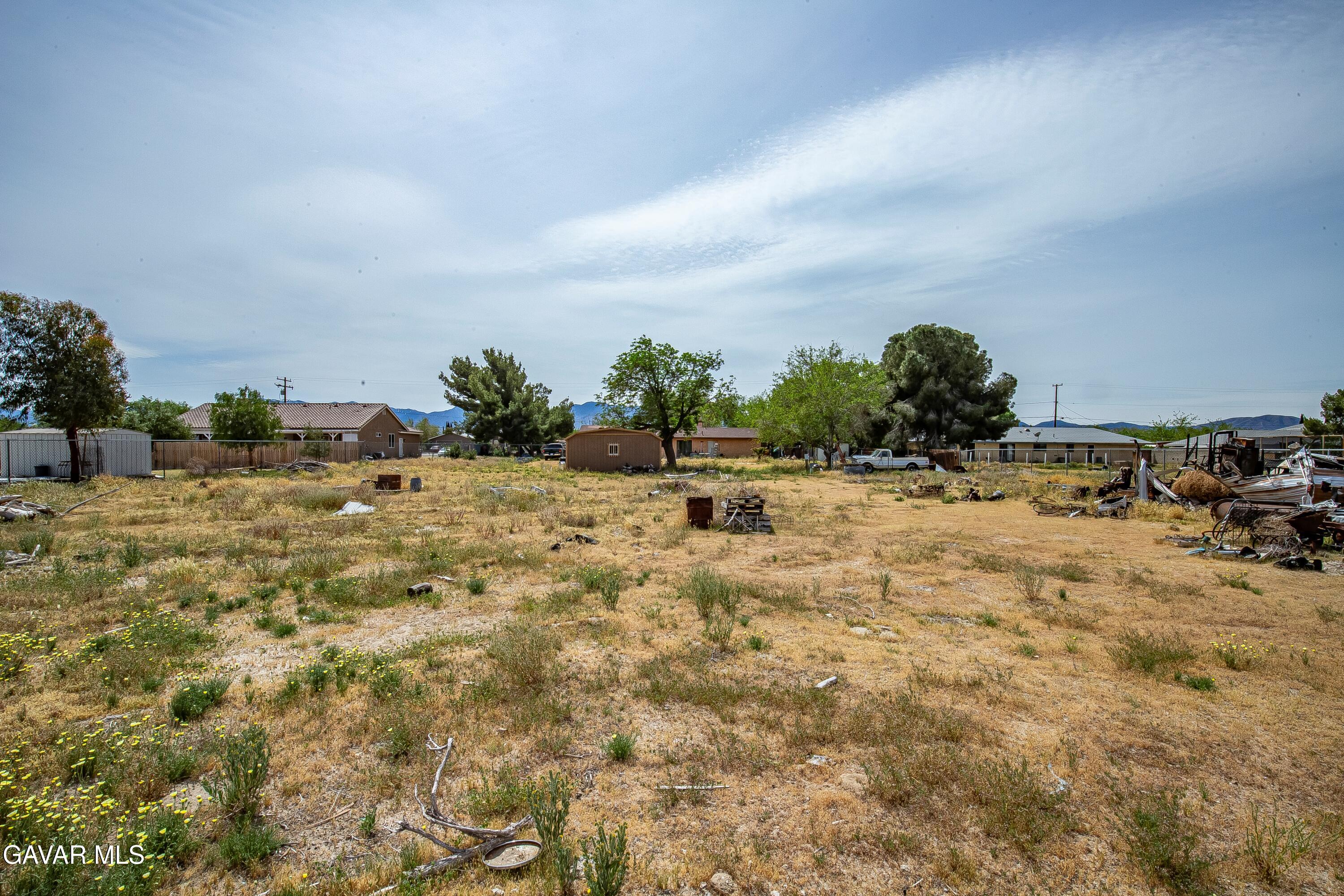 10731 East Ave R-2 Littlerock, CA 93543 - Photo 20 of 23 a view of swimming pool with a yard