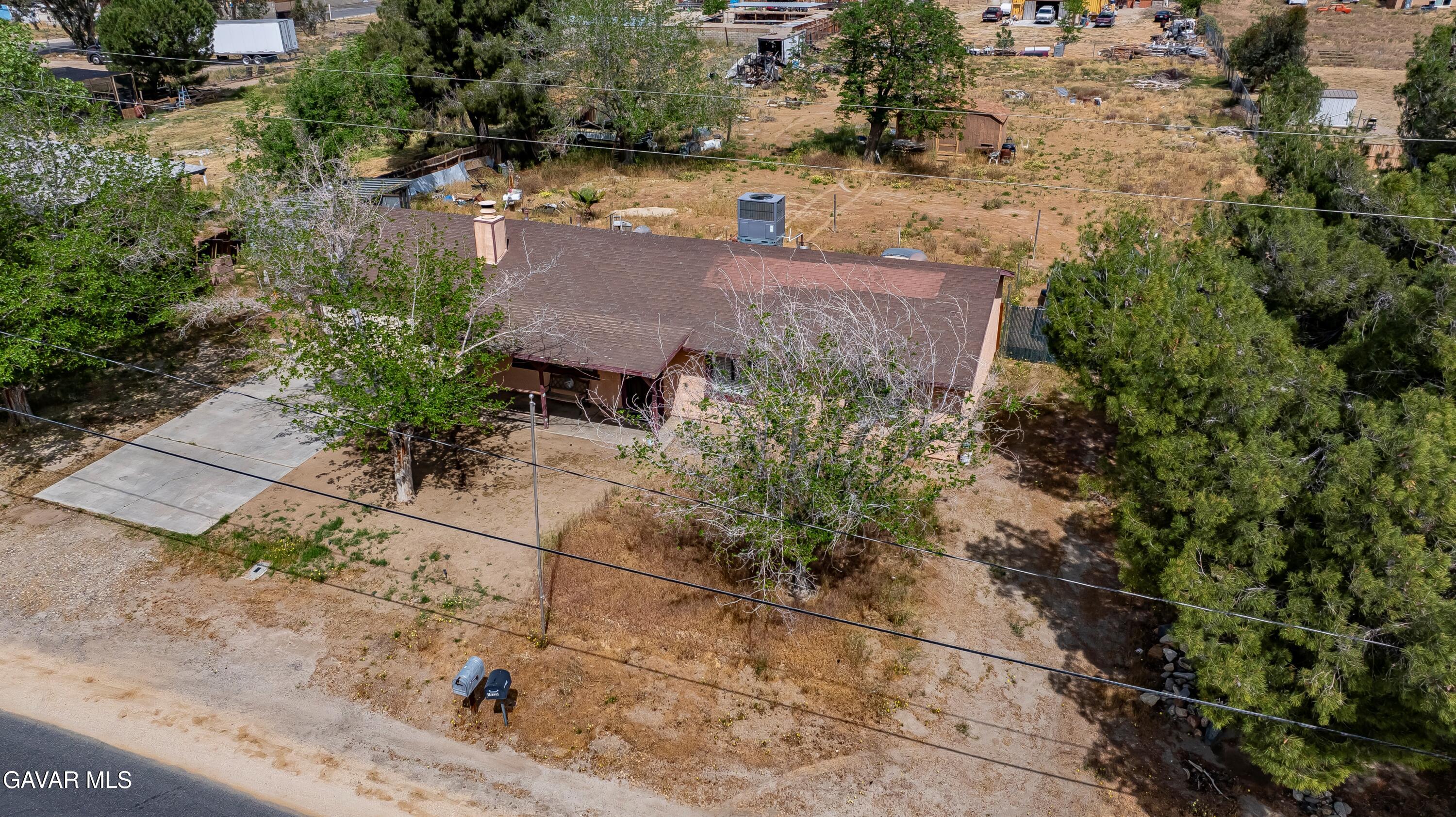 10731 East Ave R-2 Littlerock, CA 93543 - Photo 21 of 23 an aerial view of a house with a yard