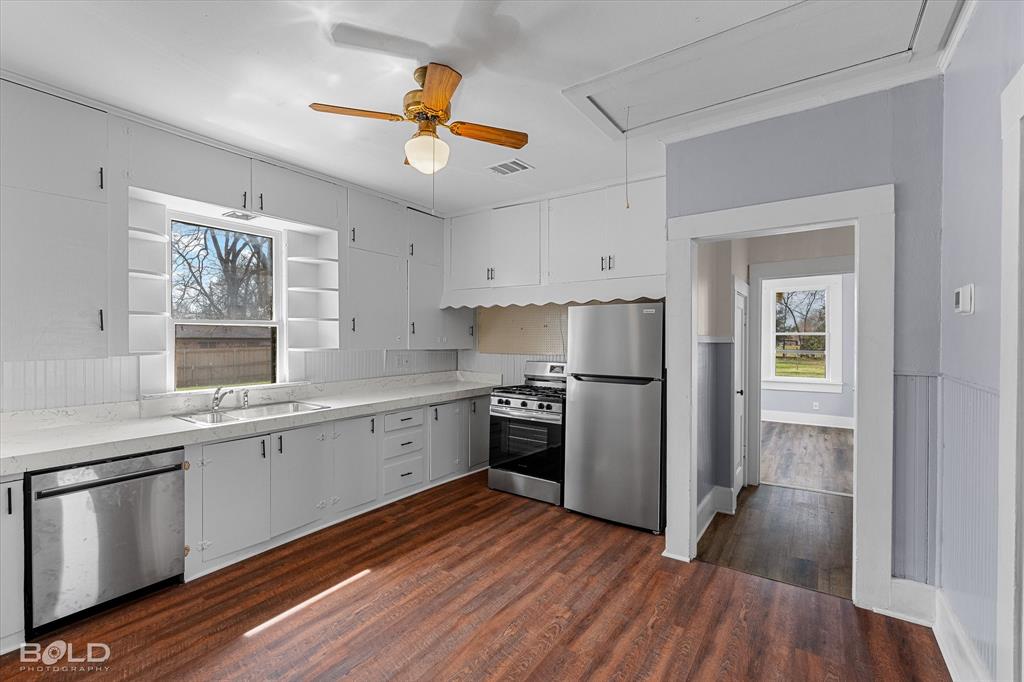 323 Butler Road Belcher, LA 71004 - Photo 12 of 28 a kitchen with a refrigerator and a sink