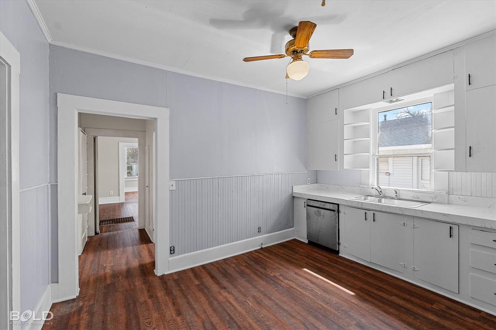 323 Butler Road Belcher, LA 71004 - Photo 16 of 28 a kitchen with a sink and wooden floor