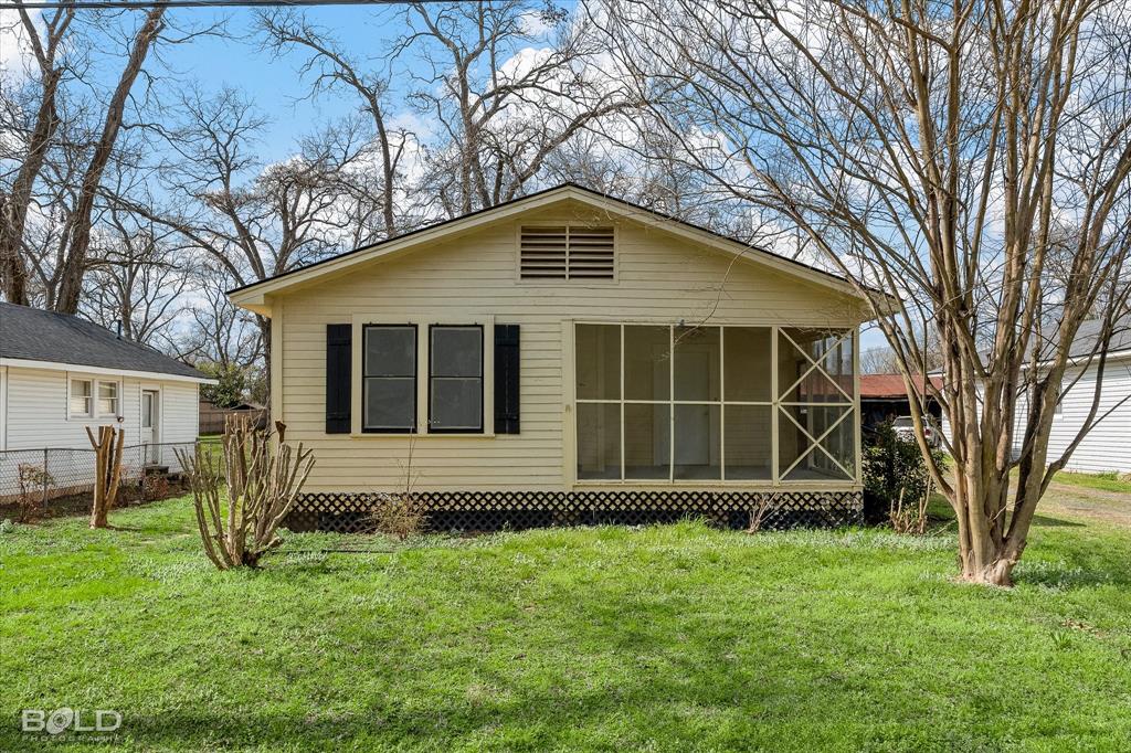 323 Butler Road Belcher, LA 71004 - Photo 2 of 28 a view of house with backyard