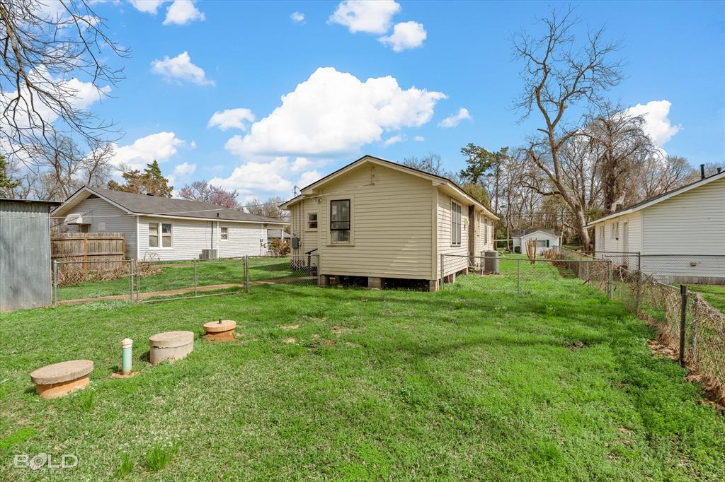 323 Butler Road Belcher, LA 71004 - Photo 25 of 28 a view of a backyard with a garden