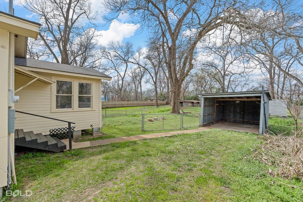 323 Butler Road Belcher, LA 71004 - Photo 26 of 28 a view of a house with a yard