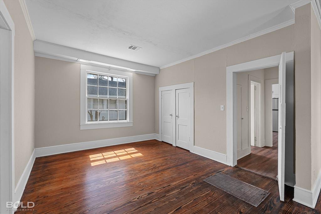 323 Butler Road Belcher, LA 71004 - Photo 8 of 28 a view of empty room with wooden floor and fan