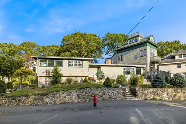 front view of a house with a street