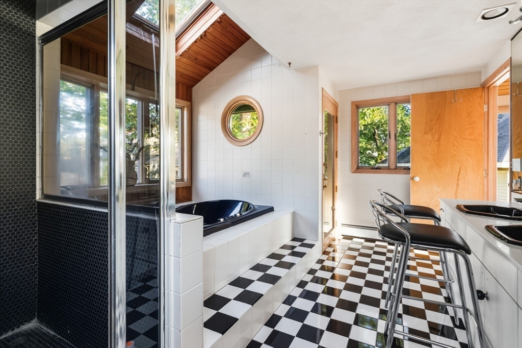 75 Bay View Drive Swampscott, MA 01907 - Photo 23 of 41 a bedroom with a bed and a window