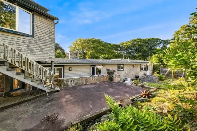 a view of a house with a roof deck