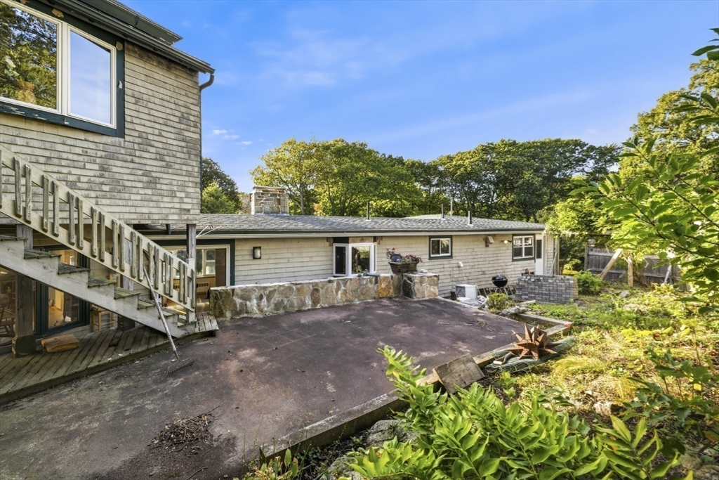 75 Bay View Drive Swampscott, MA 01907 - Photo 39 of 41 a view of a house with backyard and sitting area