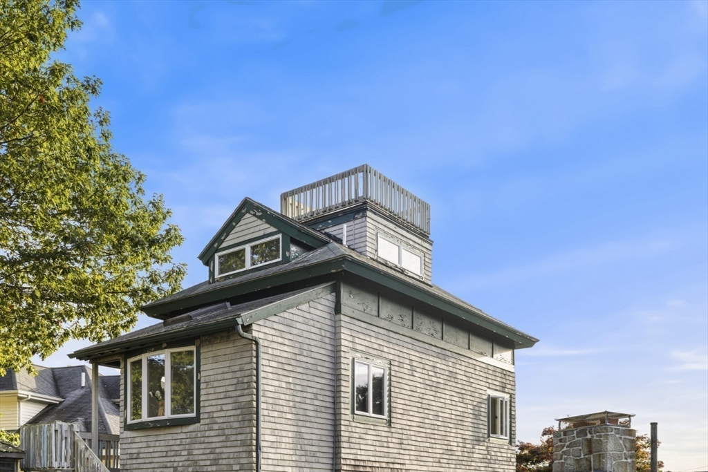 75 Bay View Drive Swampscott, MA 01907 - Photo 40 of 41 a view of a house with a roof deck