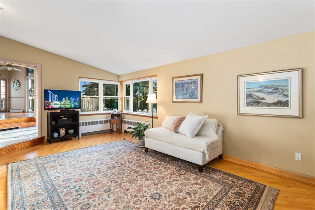 75 Bay View Drive Swampscott, MA 01907 - Photo 6 of 41 a living room with furniture and a dining table with kitchen view