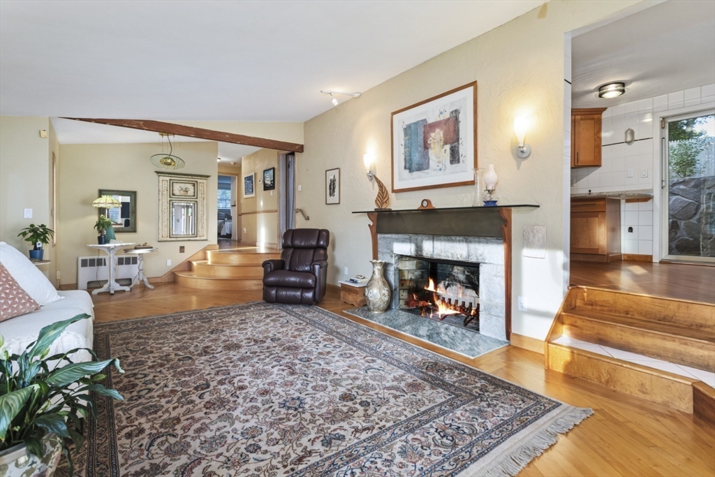 75 Bay View Drive Swampscott, MA 01907 - Photo 7 of 41 a living room with furniture and a fireplace