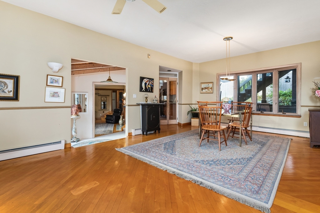 75 Bay View Drive Swampscott, MA 01907 - Photo 9 of 41 a view of a dining room with furniture and a table