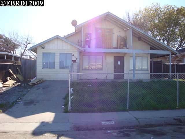 233 Shore Road Bay Point, CA 94565 - Photo 1 of 1 a front view of a house with garden