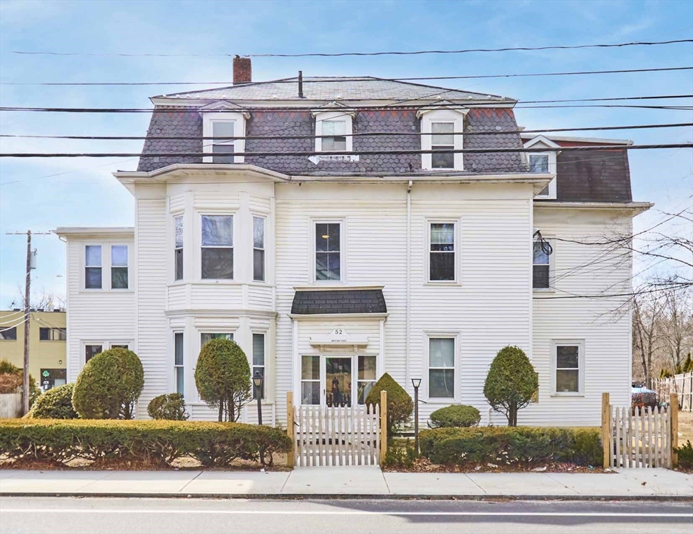 52 North Main Street Natick, MA 01760 - Photo 2 of 25 a front view of building with windows
