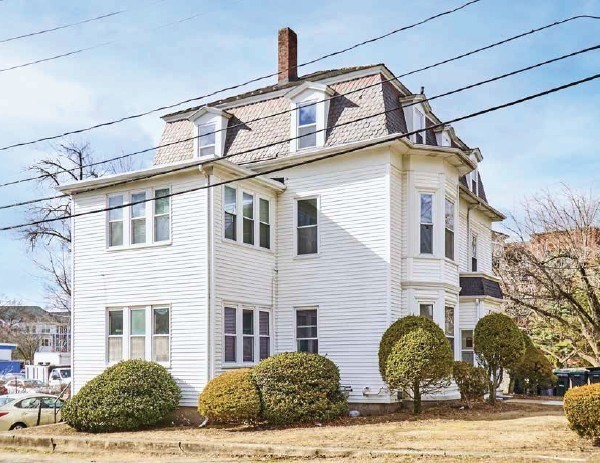 52 North Main Street Natick, MA 01760 - Photo 5 of 25 a view of a building with a window