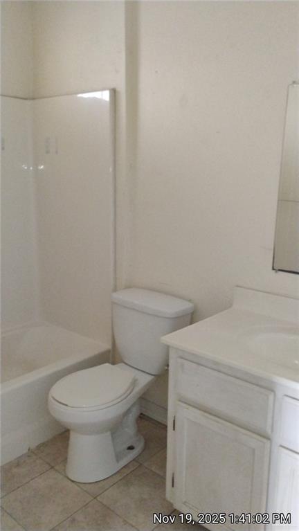 2031 Lake View Drive Mission, TX 78572 - Photo 11 of 13 a white toilet sitting next to a bath tub