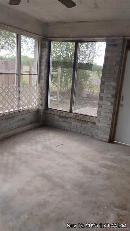 2031 Lake View Drive Mission, TX 78572 - Photo 13 of 13 an empty room with a fireplace