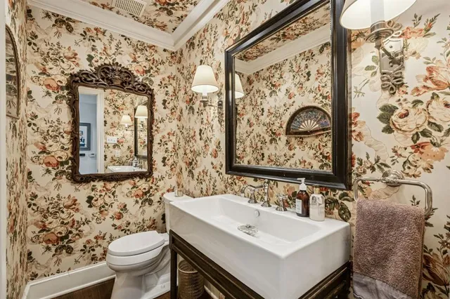 a bathroom with a sink and a toilet