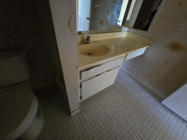 a bathroom with a sink and a bathtub