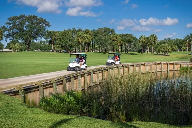 a view of a swimming pool with a lake view