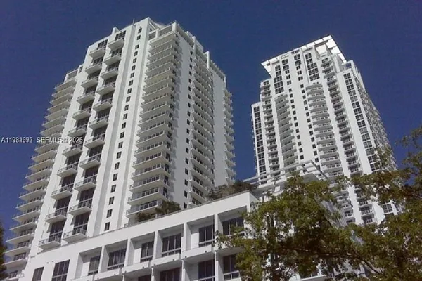a view of a city with tall buildings