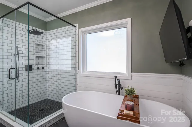 a bathroom with a sink mirror and toilet