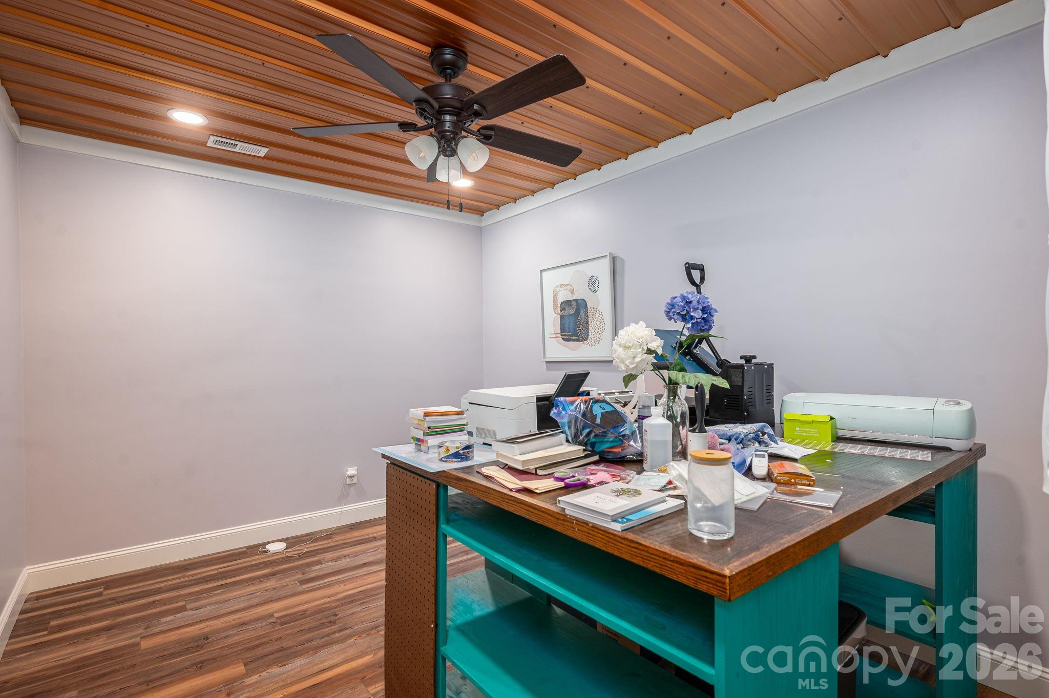 2616 Nicklaus Court Conover, NC 28613 - Photo 31 of 48 a view of a dining room with furniture and a chandelier fan